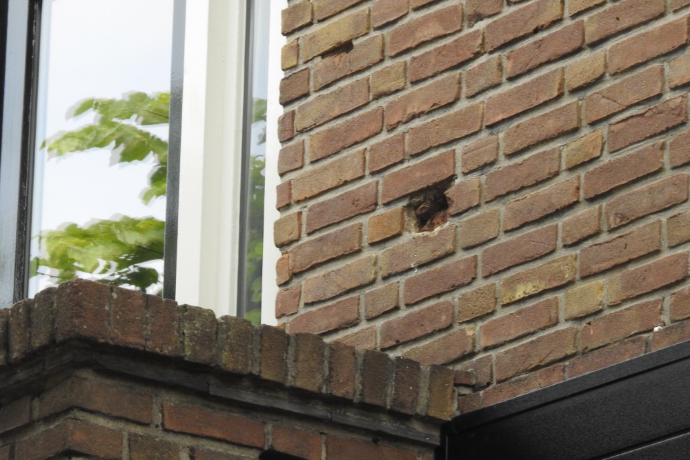 Bullet Impacts Marktstraat 42a Made